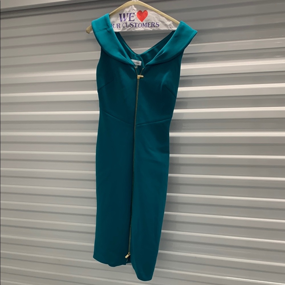 Calvin Klein Blue Jumpsuit with Long Sleeves and Tapered Legs